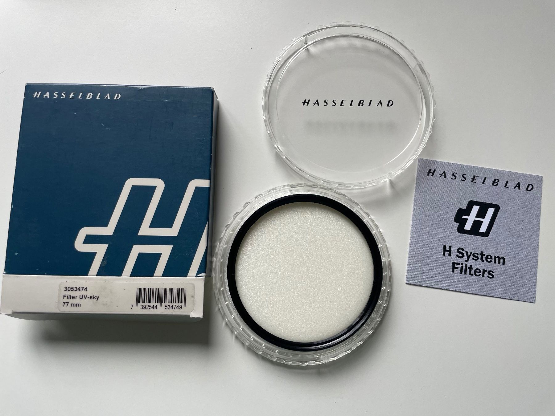 Filtri: NEU OVP: Original Hasselblad UV-Sky Filter 77mm – Nuovo e nell'imballaggio originale da Zürich venduto da si177
