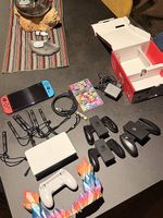 Nintendo Switch OLED + Mario Kart 8 Deluxe + accessoires