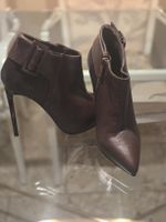 Braune Stiefeletten Ilaria Toschi mit Absatz.