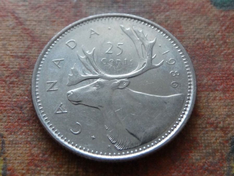 Tutti le monete: CANADA  25  Cents  1986 – Usato da Romanel-sur-Lausanne venduto da Swift13