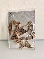 Drei goldene 3D Origami Vögel