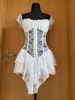 Spitzenjumpsuit in Miederoptik