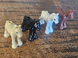 lego lot de 4 chevaux ( poulain )
