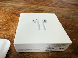 Apple Airpods mit ladecase und verkaufsschachtel