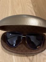 Lunettes de soleil Gucci violettes avec étui