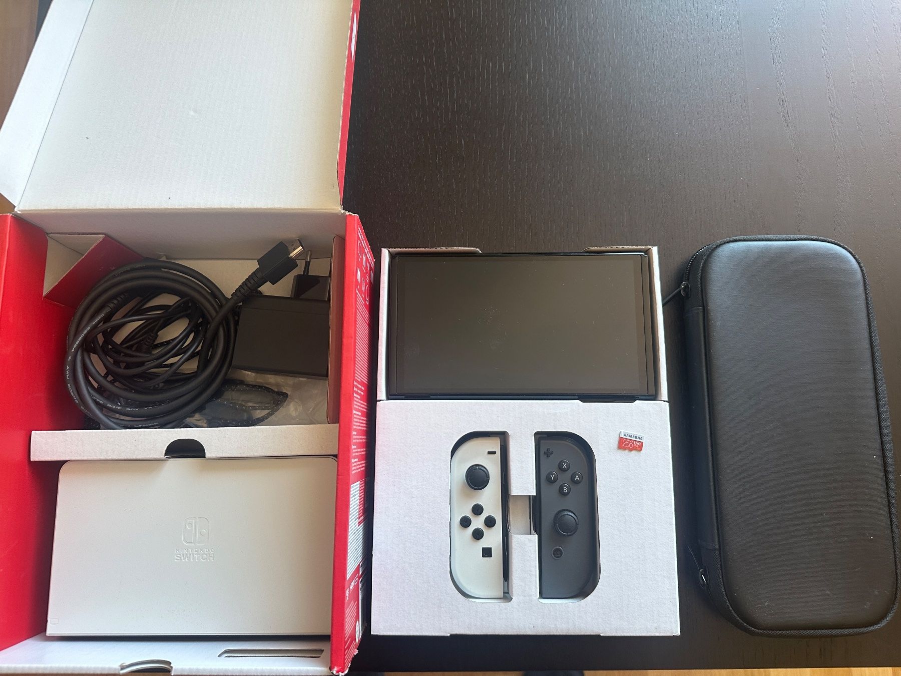 Nintendo Console: Nintentdo Switch Oled + Case + SD Card – Usato da Zürich venduto da martpie 1
