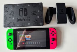 Console Nintendo Switch avec dock et manettes défectueux
