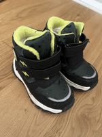 Bottes d'hiver enfant noires à doublure jaune taille 24