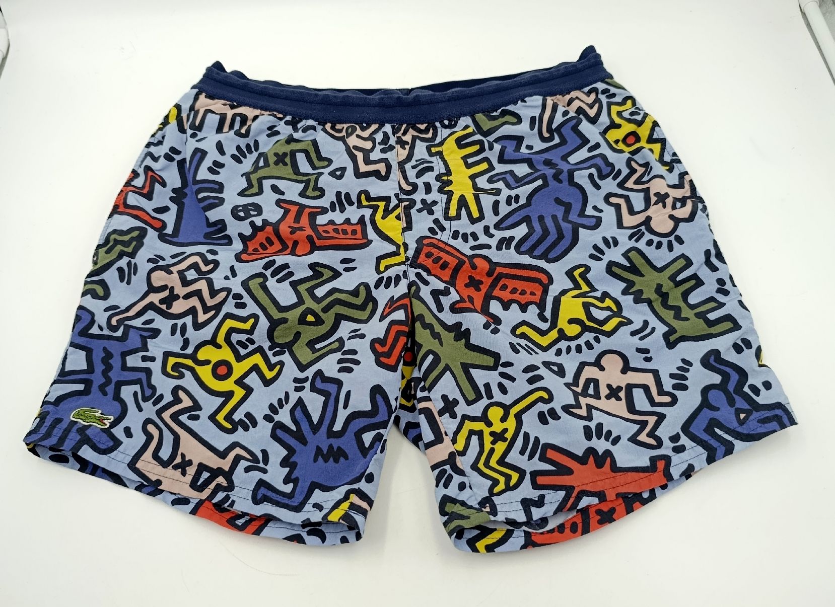 Lacoste Hosen: Lacoste x Keith Haring Badehose, Grösse M – Gebraucht aus Wil SG von Donaldus