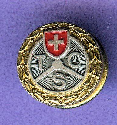 TCS Plaketten & Abzeichen: TCS   Logo  goldig – Gebraucht aus Winterthur von Sammleroase