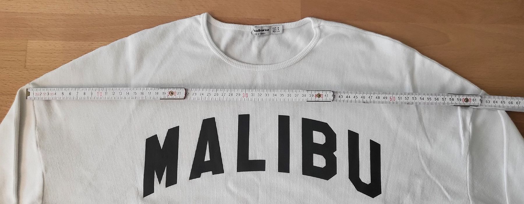 Stradivarius Top: Stradivarius Crop-Pullover Malibu Weiss Gr. M – Usato da Baar venduto da deg_d6l5 4