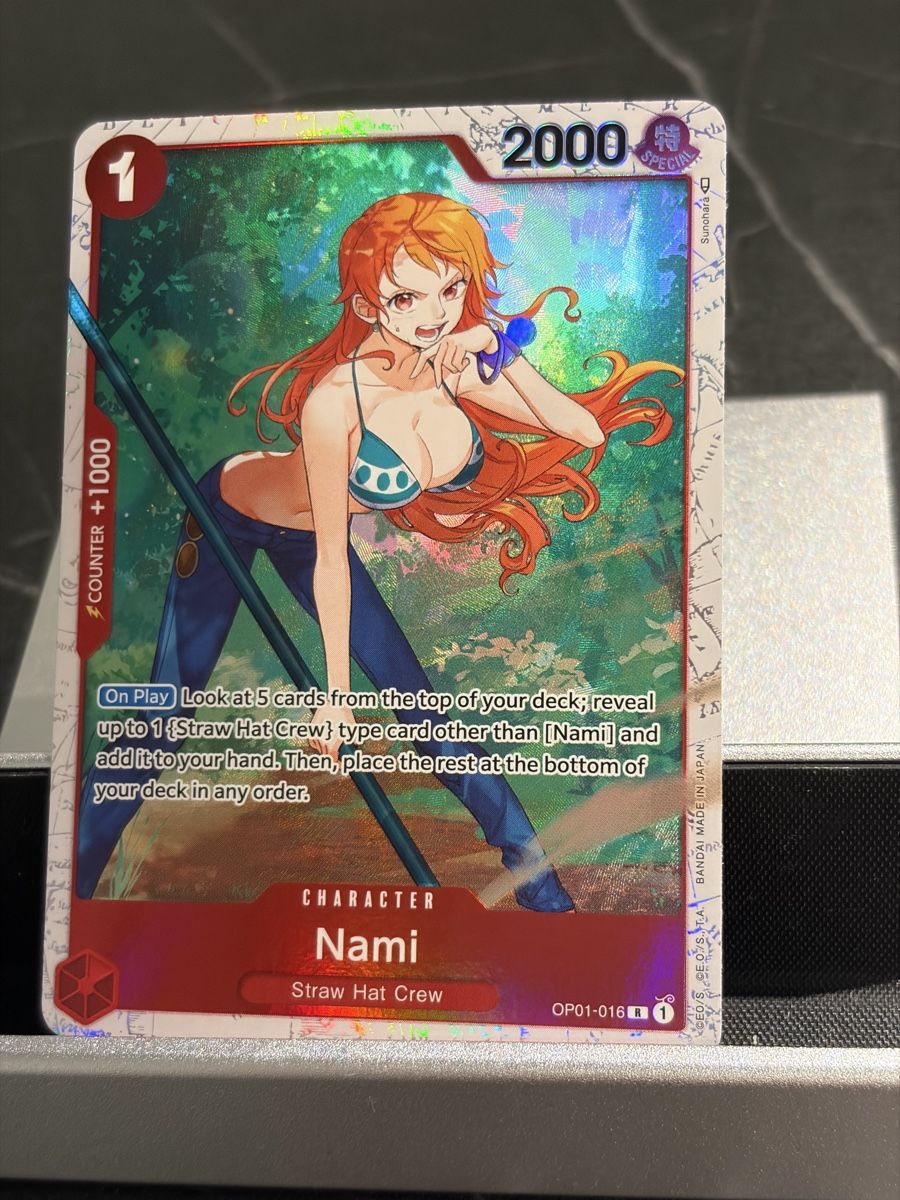 Bandai Carte collezionabili: One Piece OP01-016 Nami, Englisch – Nuovo (secondo la descrizione) da St. Gallen venduto da cambitcg