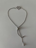 Bracelet Swarovski ajustable (neuf, excellent état)