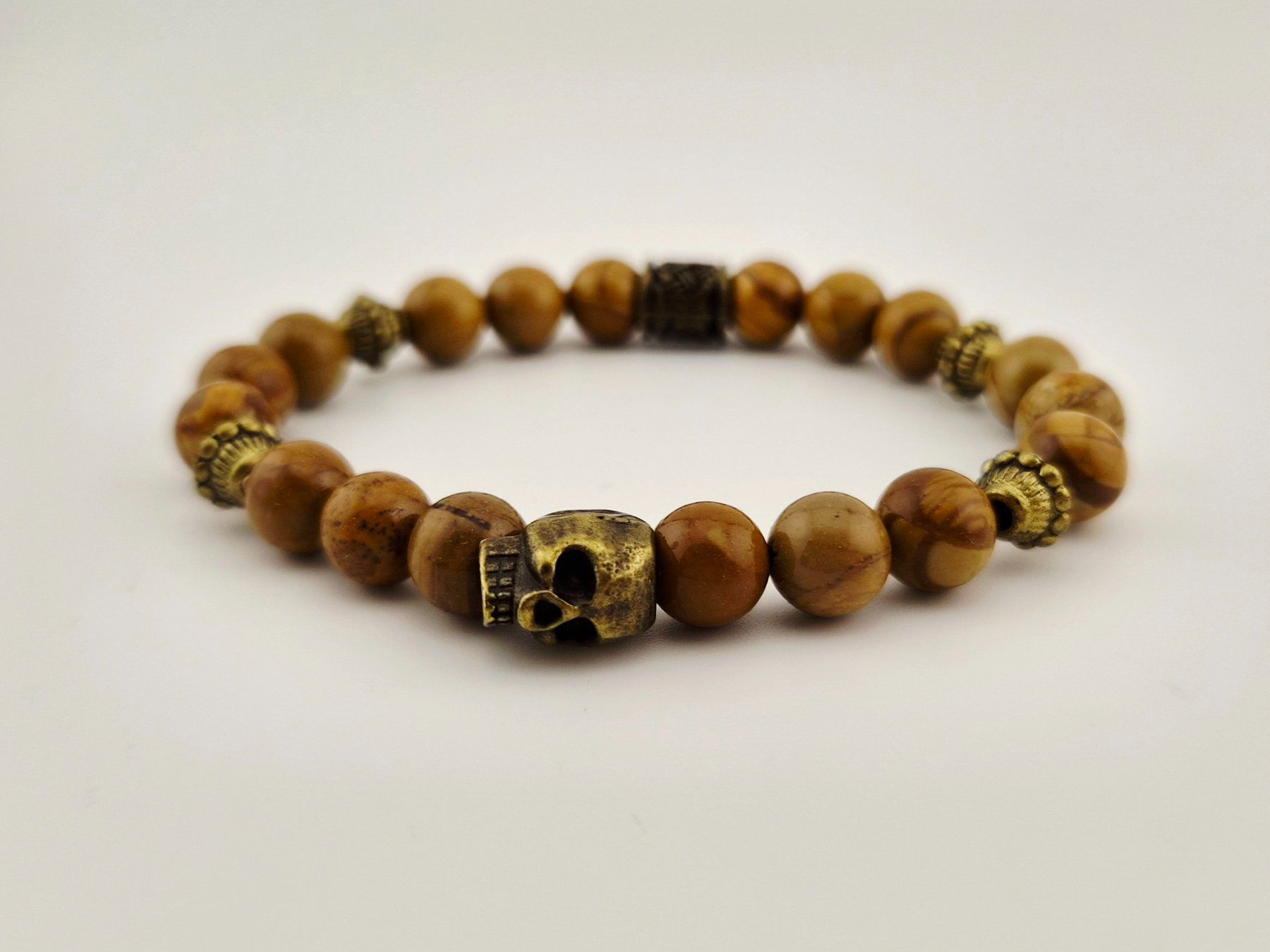 Bracelets: Skull-Armband Versteinerte Holzperlen Braun – Neuf avec emballage d'origine à Thalwil par seasons 1
