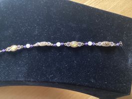 Armband mit Perlen und Schmuckelementen gebraucht