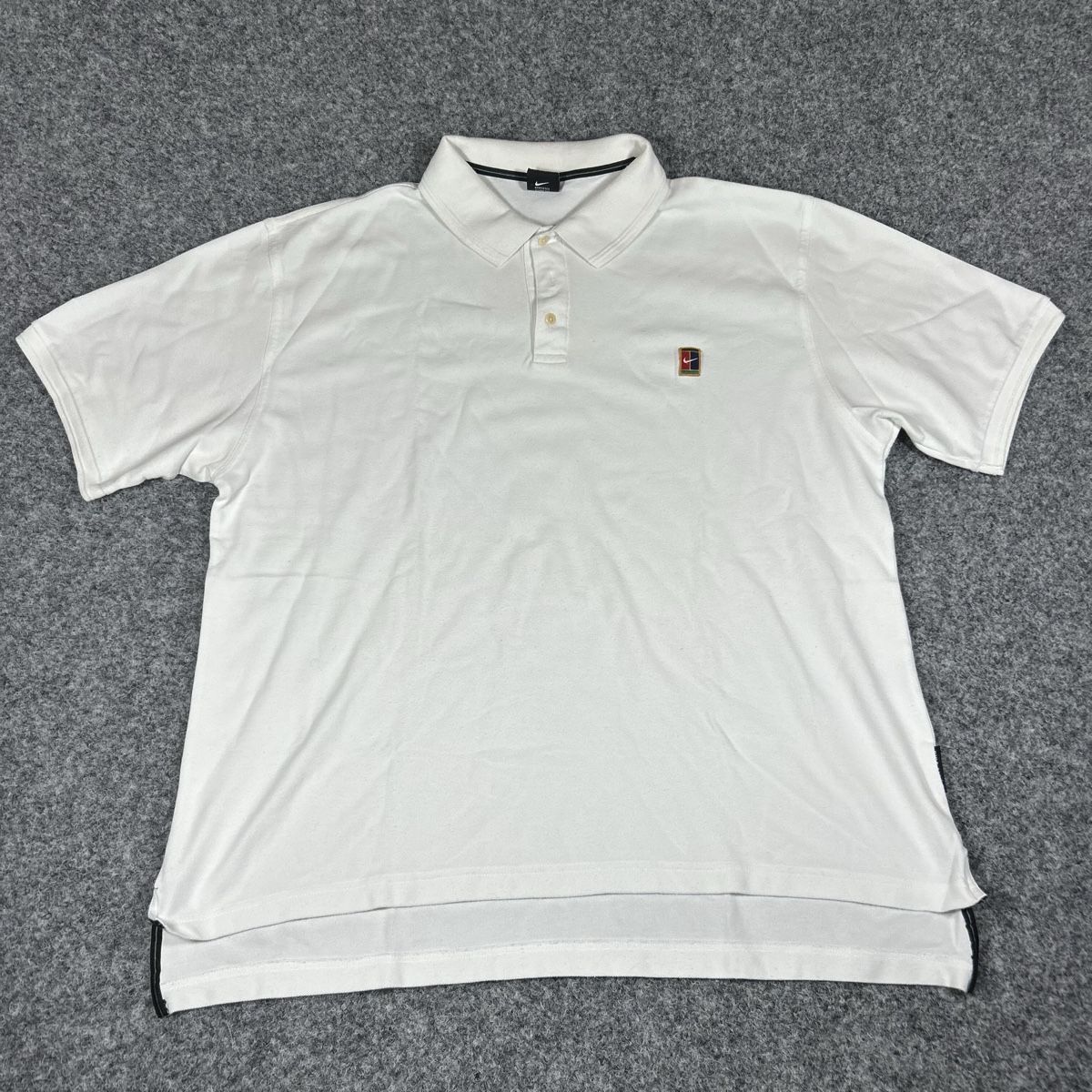 Nike Polos: 2000s nike tennis polo  – D'occasion à La Sagne NE par Matlasape