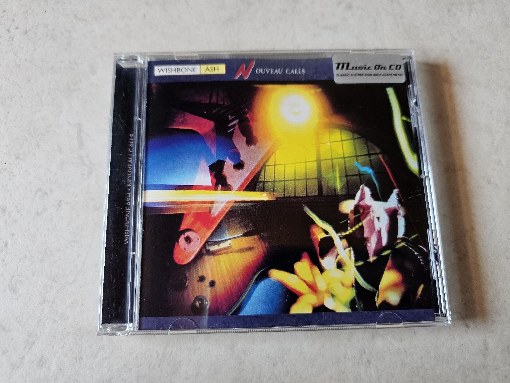 CD: Wishbone Ash  -  Nouveau Calls – Usato da Schneisingen venduto da backstore24