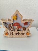 Herbstblatt mit Licht aus Holz