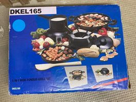 Ein Wok- Grill- Fondue Set in Verpackung