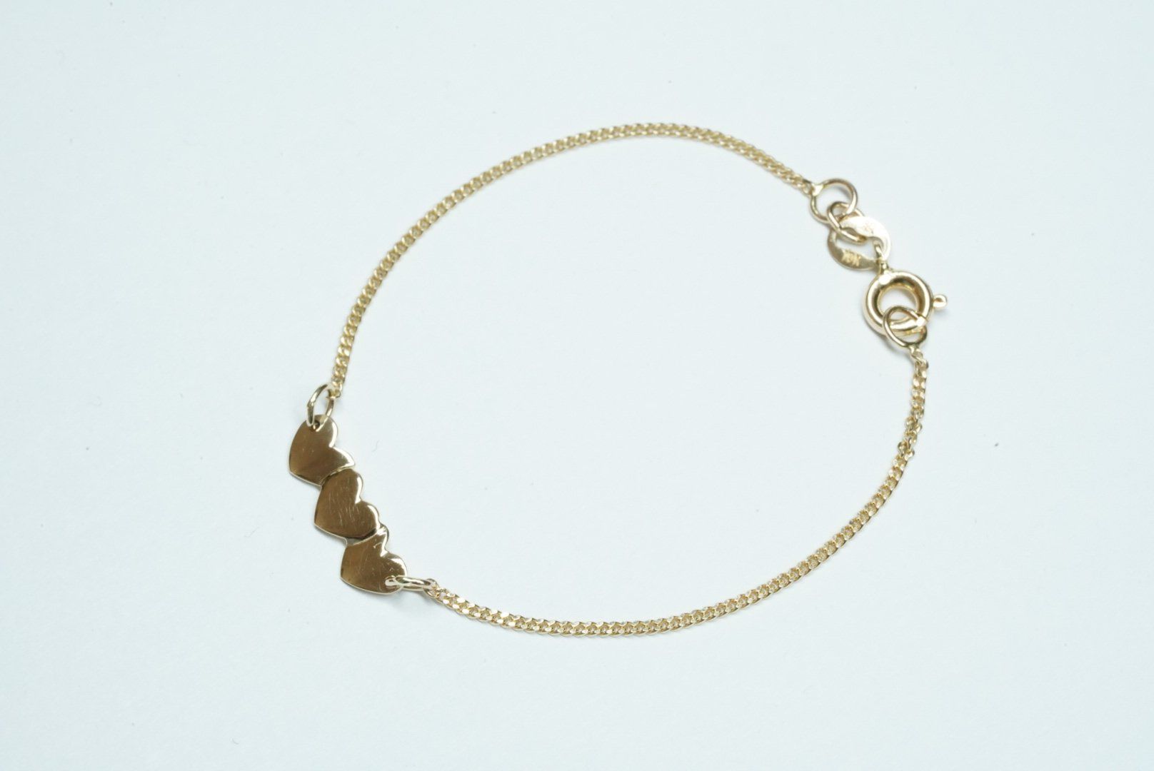 Bracciali & Braccialetti: Kinderarmband Gelbgold 9k mit Herzen – Usato da Bülach venduto da Re-Jewelled 2