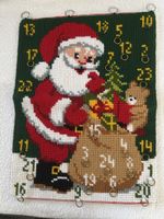 Adventskalender von Hand gestickt.     