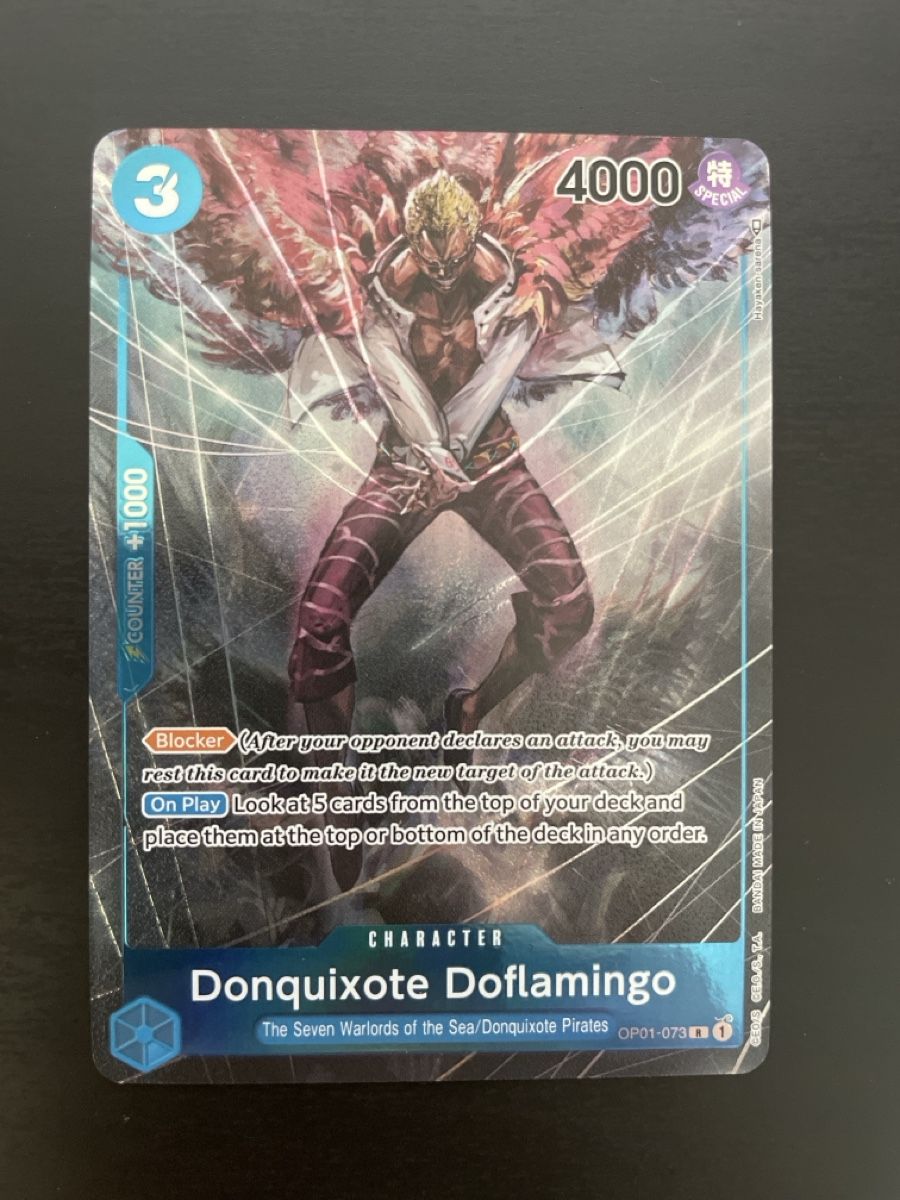 Bandai Carte collezionabili: Doflamingo (op01-073) NM – Nuovo (secondo la descrizione) da Savosa venduto da RyumaSenpai97