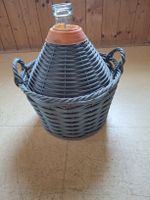 Korbflasche für Schnaps