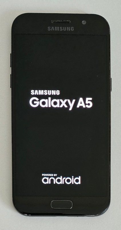 Samsung Portables: Samsung Galaxy A5 mit Lederetui – D'occasion à Niederrohrdorf par Dynamik