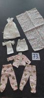 alte Puppenkleichen zum Basteln mit einem Stück altem Stoff 
