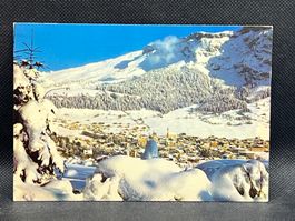 Flims-Dorf gegen das Skigebiet von Foppa und Cassons