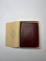 Porte-cartes Must de Cartier en cuir bordeaux