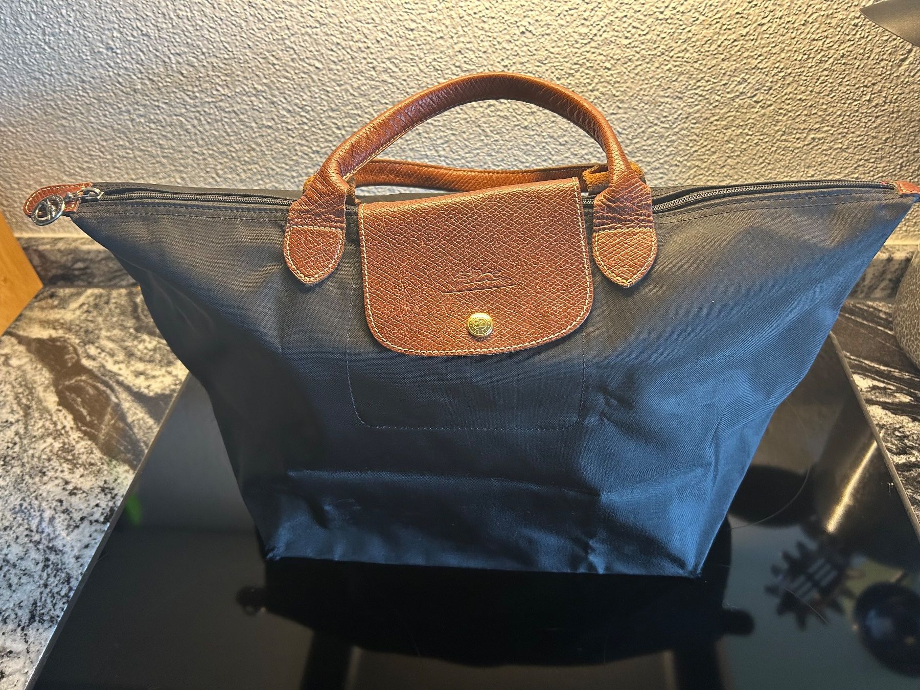 Longchamp Borse da donna: Original Longchamp Le Pliage Grösse M schwarz – Difettoso da Langnau am Albis venduto da SolarisZH 4