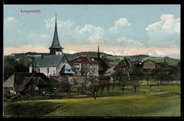 AK Lauperswyl, Ort mit Kirche und Bergen im Hintergrund