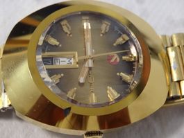RADO DIASTAR.AUTOMAT.DAT.TAG.25J.GOLDEN FARBE.LÄÜFT-35X42MM