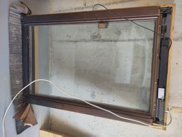 Velux Dachfenster mit Holzrahmen, Motor und Regensensor.
