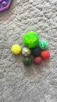 Set of 8 bouncy balls mixed sizes used condition