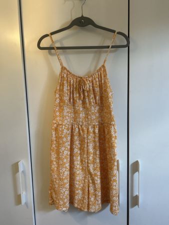 Jumpsuit Orange mit Blumen Grösse 40 neuwertig
