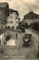 Disentis   GR   -   Dorfstrasse  mit POSTAUTO