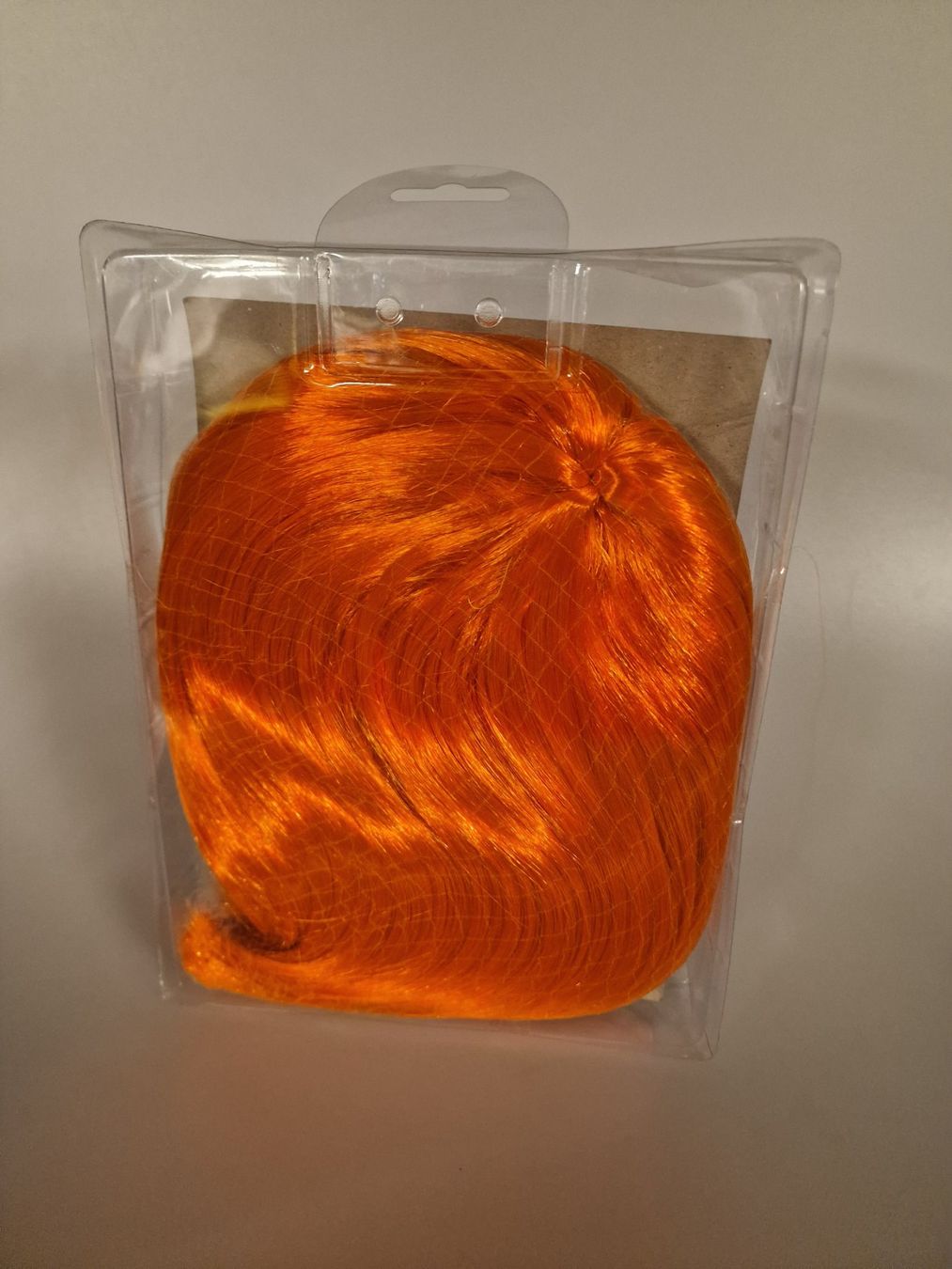 Parrucche: Perücke Glamour Wig Orange Neu – Nuovo e nell'imballaggio originale da Oberuzwil venduto da aseinkaufswelt 1
