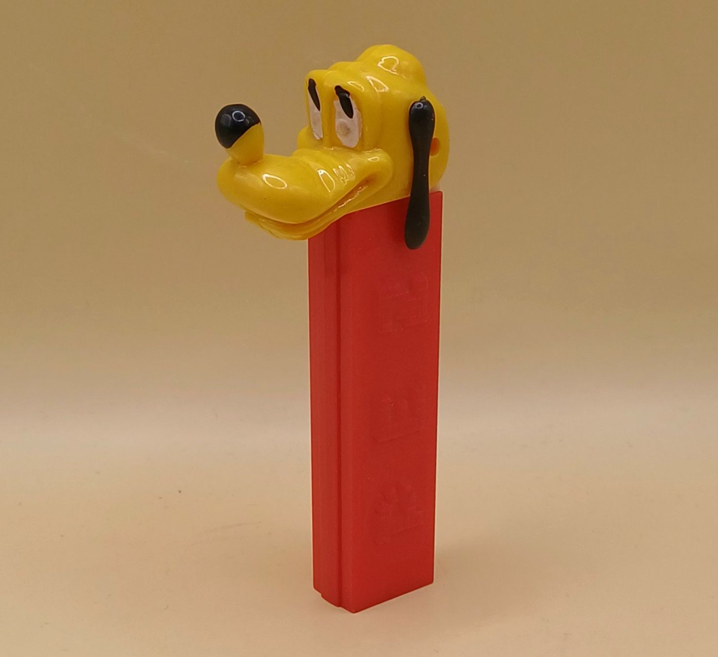 Pez Statuette: Vintage PLUTO Pez Spender 70er – Usato da Brittnau venduto da simionius
