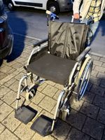 Rollstuhl Molly mit Schiebe und Bremshilfe Motor