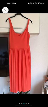 Vestito arancione taglia M a pieghe usato