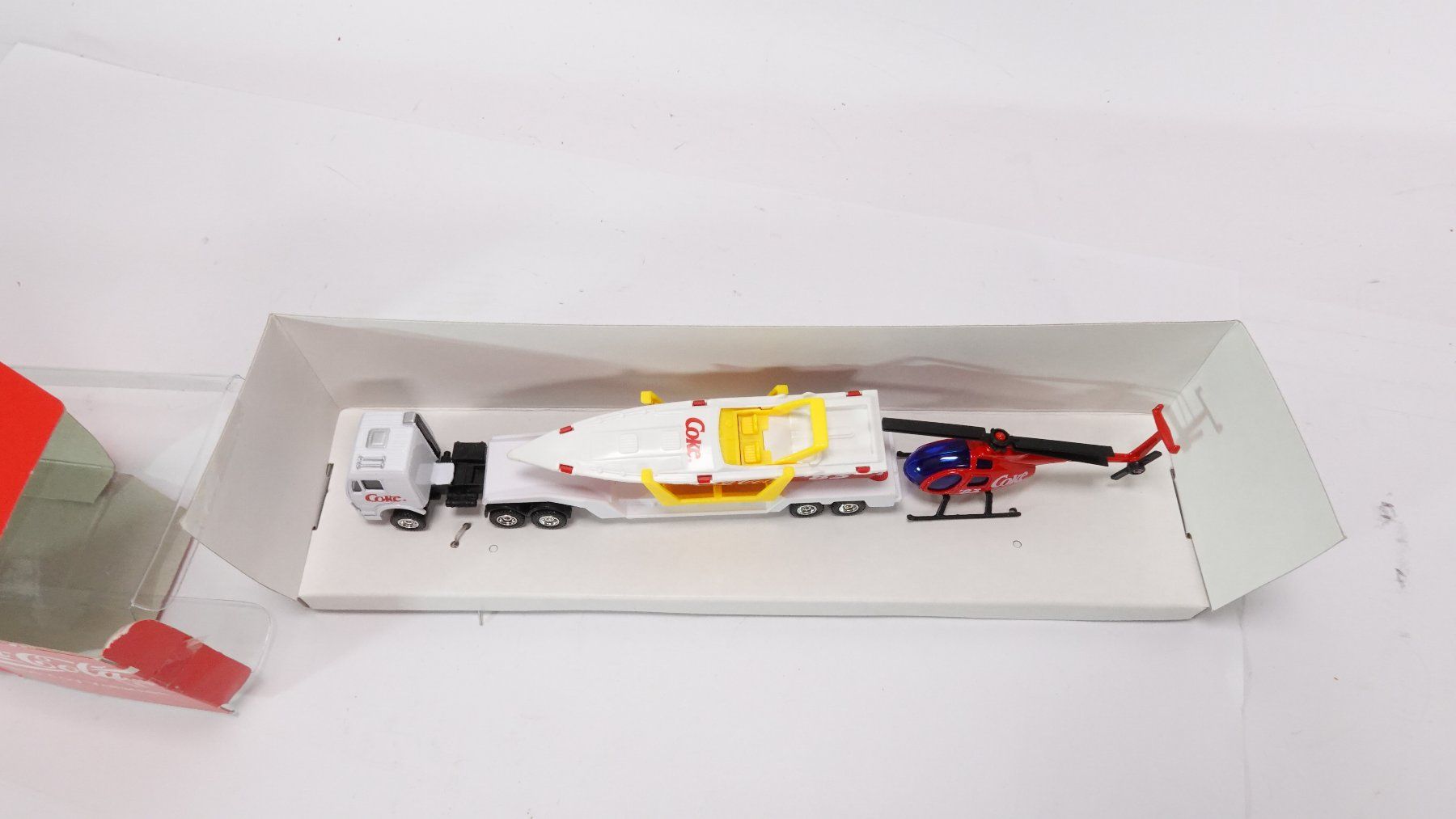 Coca-Cola Modellini d'auto: c1 Coca Cola Powerboat mit Helikopter – Usato da Uetendorf venduto da tigermuegi 2