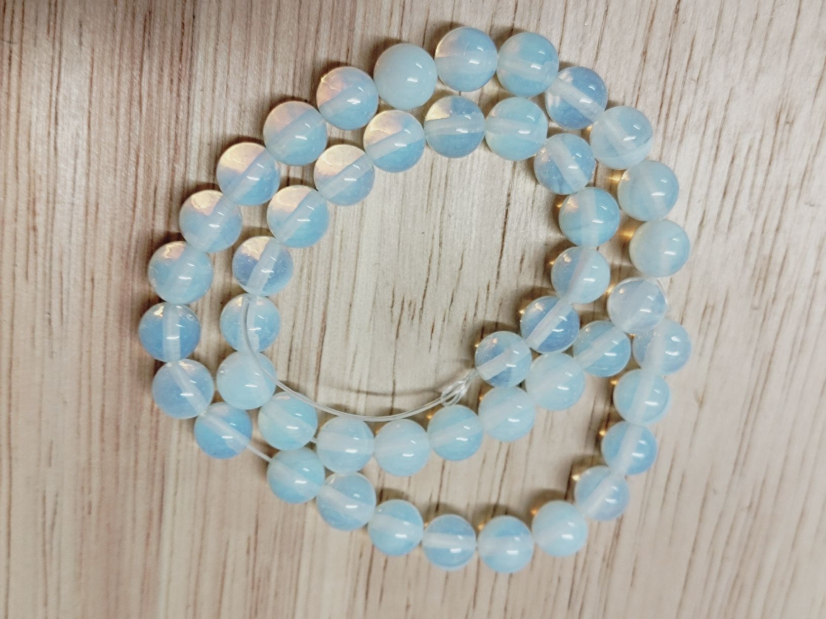 Pietre preziose: weisser Opal Strang 8mm – Nuovo e nell'imballaggio originale da Steinmaur venduto da Cinderella309