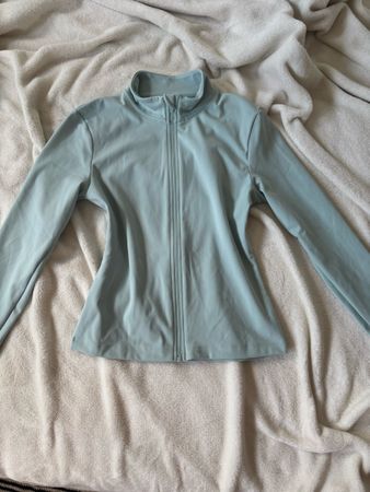 Sportshirt mit Reissverschluss hellblau Grösse S