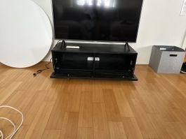 TV-Lowboard schwarz mit Klapptüren gebrauchter Zustand