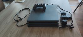 PlayStation 4 Pro - Konsole mit Controller und Ladestation