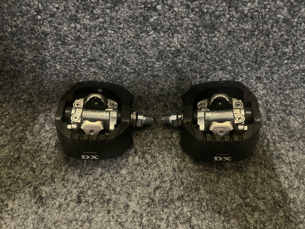 Pédales Shimano SPD vs SPD-SL : quel est le bon système pour vous