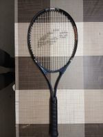 Raquette de tennis en bon état
