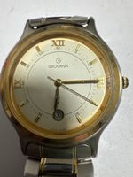 Montre Grovana Suisse homme or et argent bon état